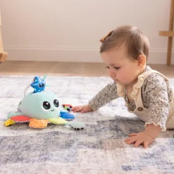 Lamaze Jouet musical poussette Sam la Pieuvre^ Hochets Et Jouets D'Activités