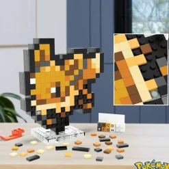 MEGA Pokémon Pixel Art Evoli à construire^ Super Héros, Cinéma Et Jeux Vidéo