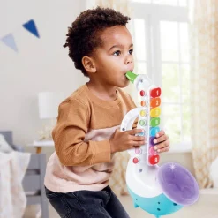 Varta Saxophone lumi magique^ Instruments À Vents