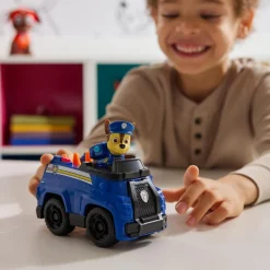 Spin Master Voiture de Patrouille Chase - Véhicule 15 cm et figurine La Pat Patrouille^ Les Héros Et Personnages